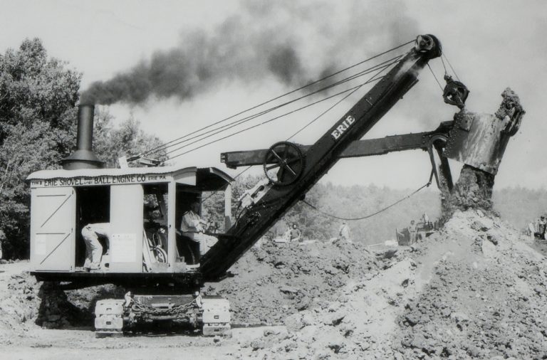 Bucyrus Erie B crawler revolving shovel with equipment for pile driver