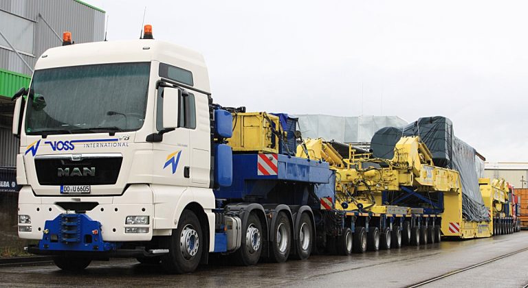 MAN TGX 41.680 «Voss International» truck tractor with trailer Goldhoffer