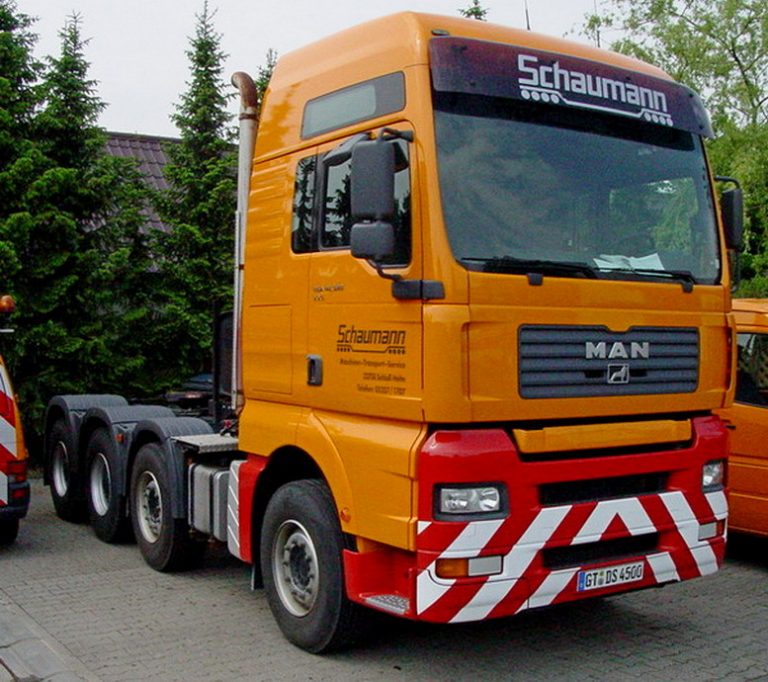 MAN TGA 41.660 XXL «Schaumann» heavy haulage tractor with semi-trailer-bridge trailer Goldhofer