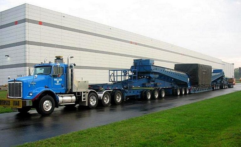 Road train for super-heavy loads «Miller Transfer and Rigging Co.» of two tractors Kenworth T800W BS217 and F217 and trailer Goldhofer