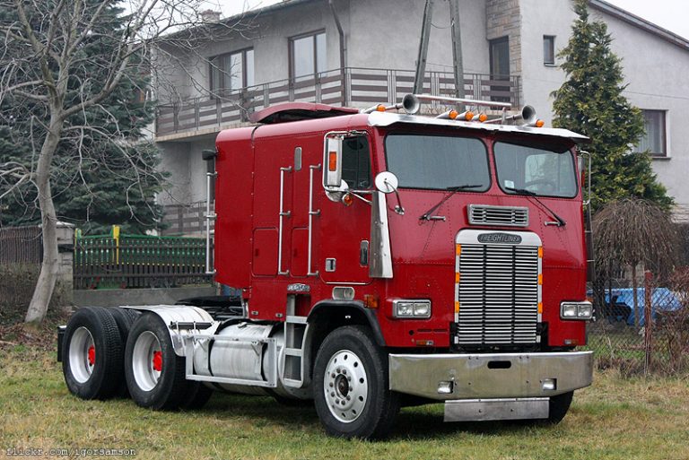 White Freightliner FLA 9664T Powerliner «MG Industries» truck tractor with 3-axle semi-trailer-tank TT 300