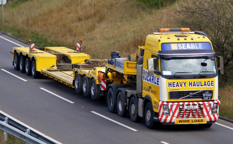 Road train, truck tractor Volvo FH II 16-550 «Les Searle» and trailer Nooteboom 4-axle PXE + Interdolly 3-axle ICP