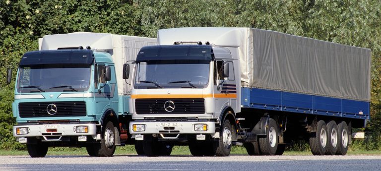 Mercedes-Benz NG 1632S Highway truck tractor with side semi-trailer-van