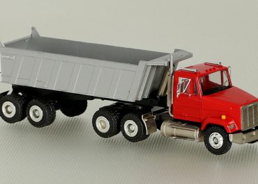 Freightliner FLС 112 truck tractor with rear dump truck semi-trailer Meiller-Kipper MHKS 40/2