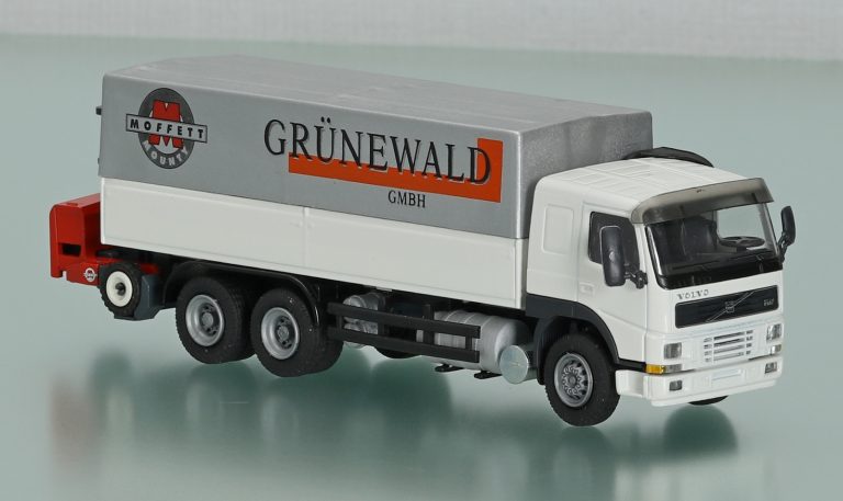 Volvo FM 7-290 «Grunewald GmbH» flatbed car with awning and forklift truck Moffett-Kooi M5-20.3
