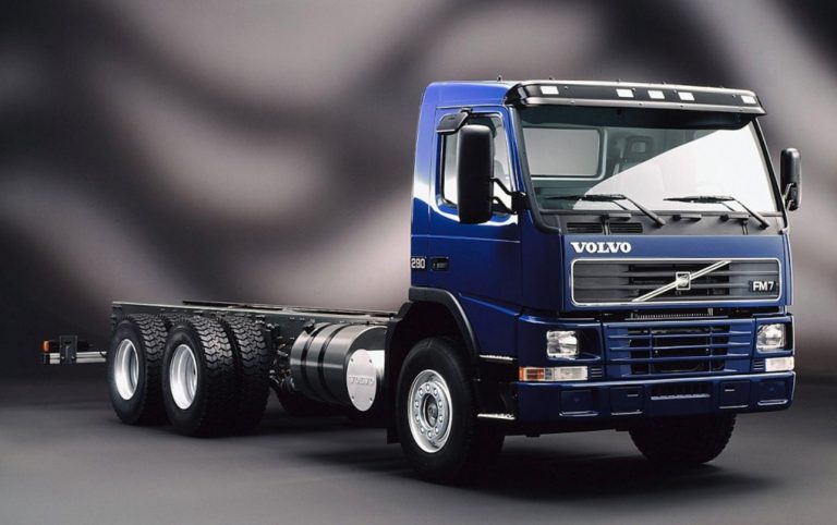 Volvo FM 7-290 «Grunewald GmbH» flatbed car with awning and forklift truck Moffett-Kooi M5-20.3