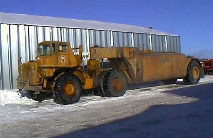 Caterpillar 772 rock truck with semi-trailer Athey