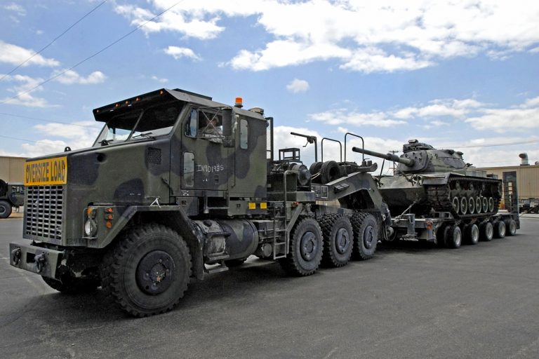 Oshkosh HET M1070 truck tractor with treller M1000 and tank M1 Abrams