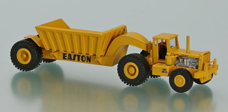 Caterpillar DW20 off-road wheeled tractor with Truck semi-trailer Easton
