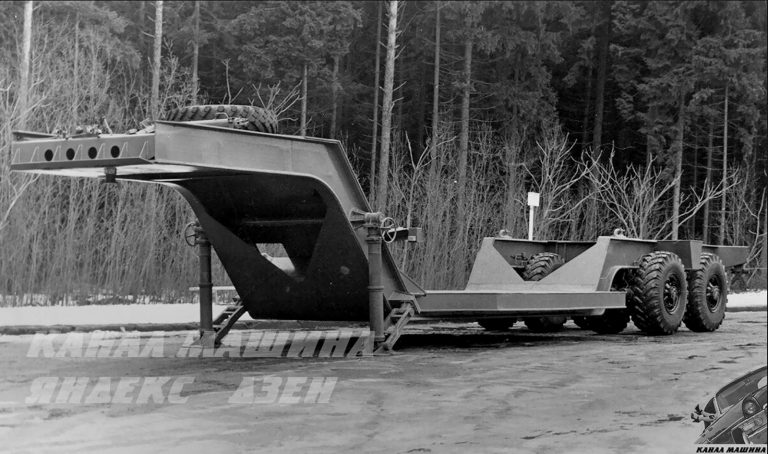 МЗКТ-5247Д  полуприцеп тяжеловоз-площадка для перевозки тяжелой техники и крупногабаритных неделимых грузов